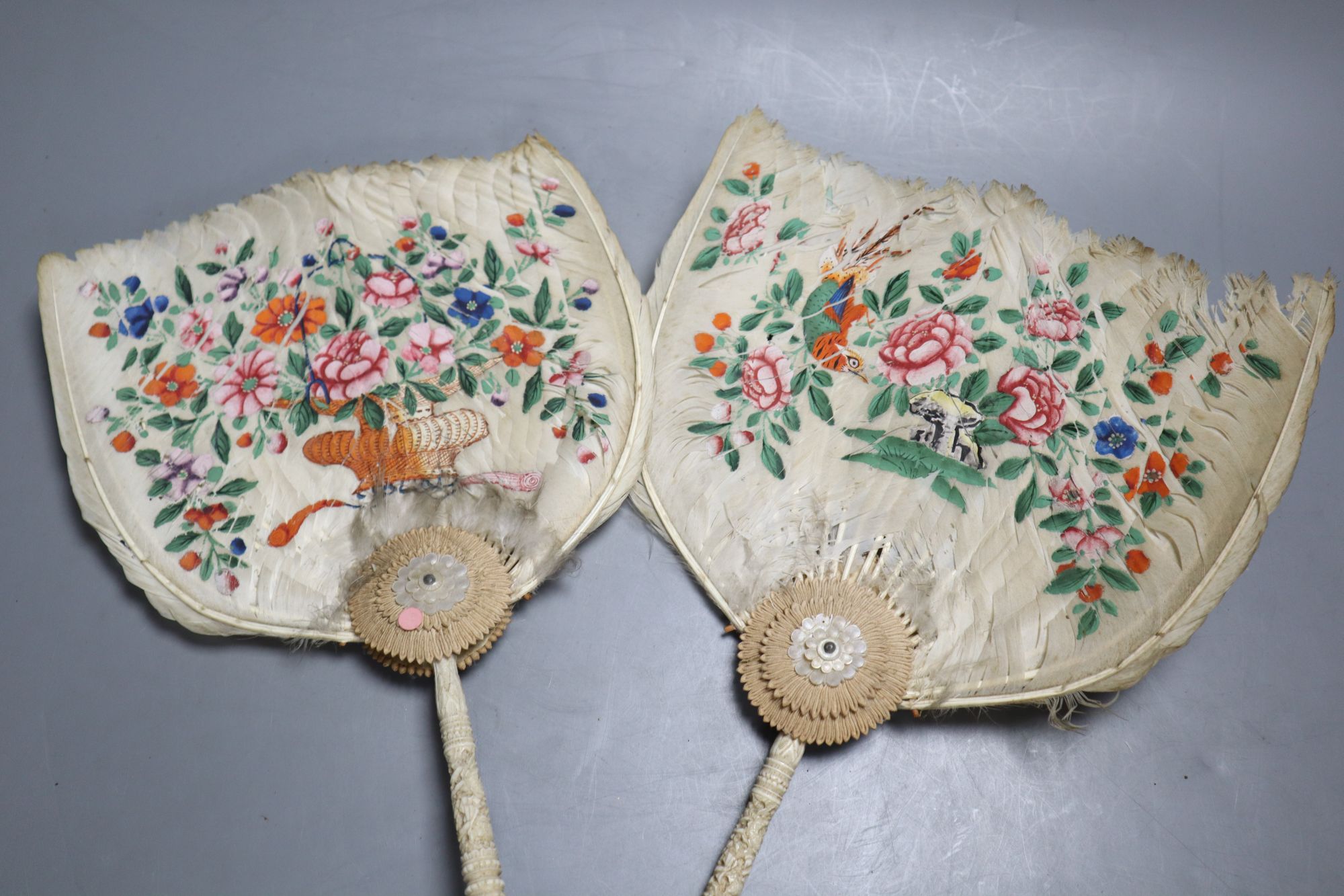 Two Chinese ivory handled painted feather fans, 19th century, length 28cm